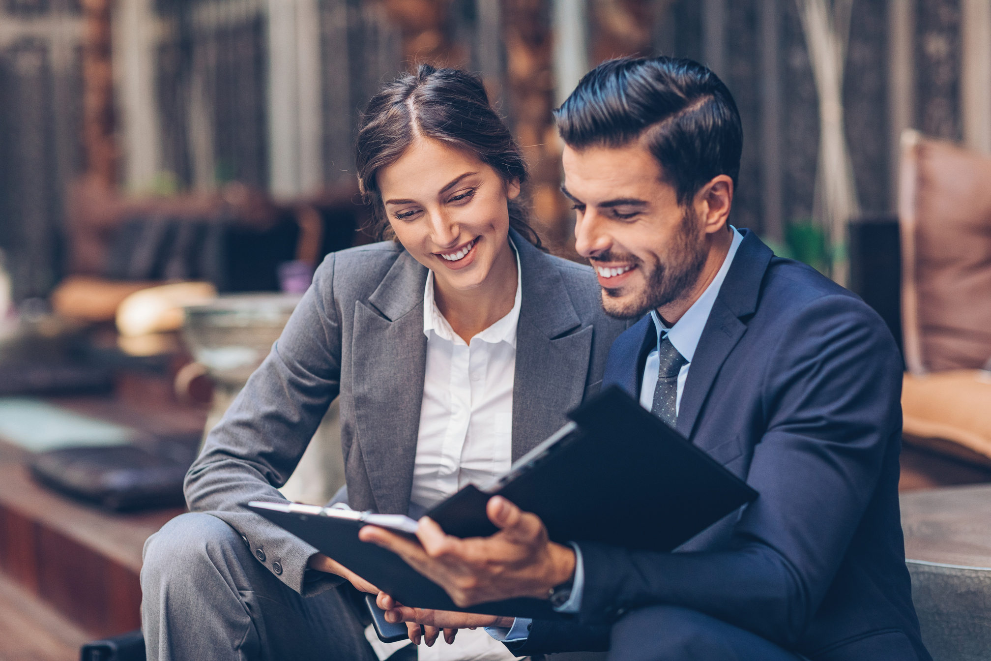Business persons discussing documents